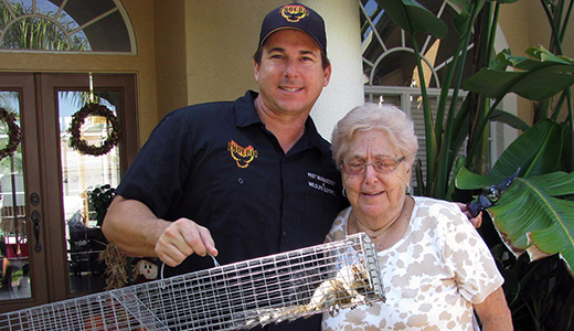 Pest Control in Riverview Florida Scared Grandma Posing With Riverview Pest Control Man Who Removed Wildlife From Her House